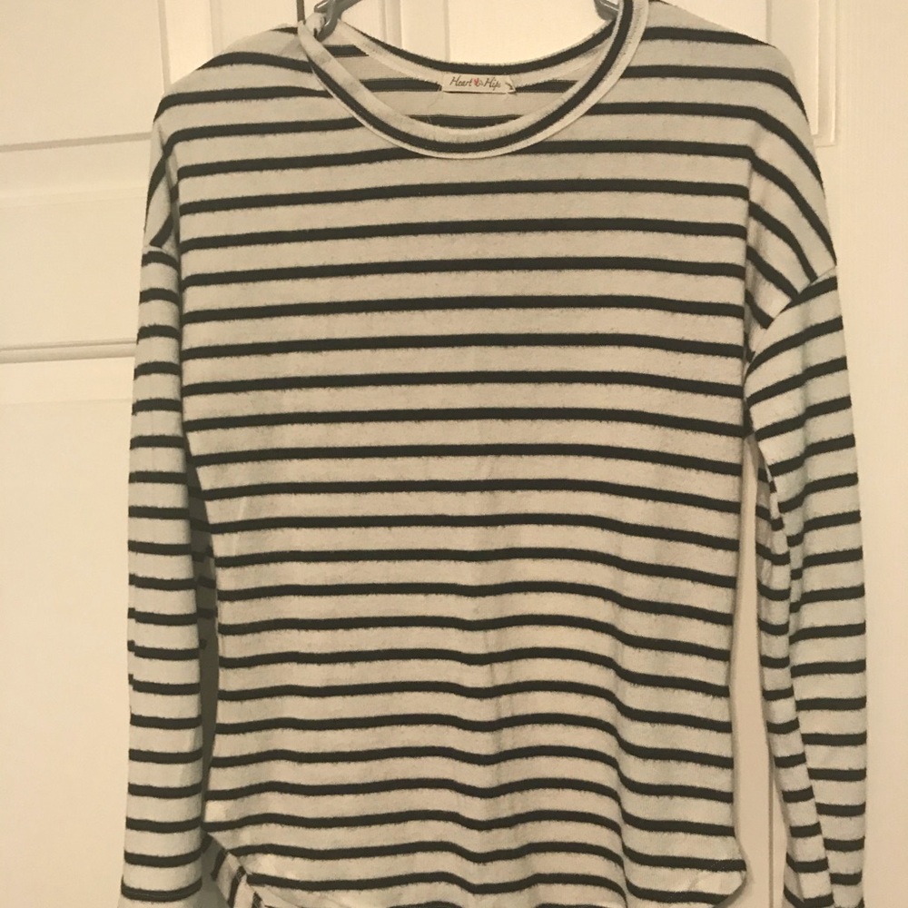 Soft cuddly black and white striped sweater.